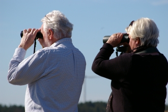 Couple with binoculars
