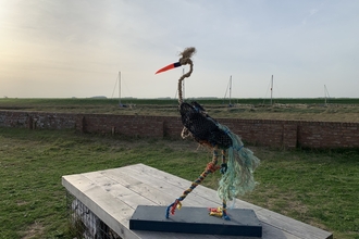 litter heron sculpture