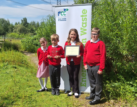 Four young members of the Grow with Nature Club at Hawthorn Tree School, Boston, winners of the Lincolnshire Young Environmentalist Awards 2023