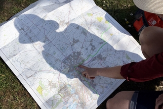 Person pointing at a map (c) Fiona McKenna