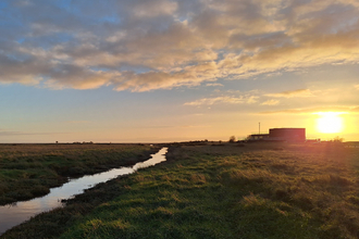Winter dusk view back towards the Gibraltar Point Visitor Centre