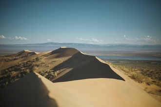 Sand dunes and mountains in Kazakhstan