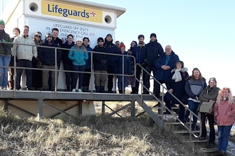 people outside lifeguard station