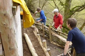 Volunteers fence contstructing