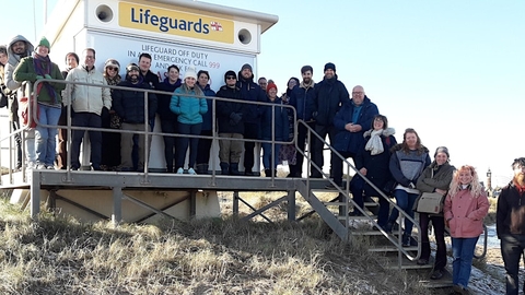 people outside lifeguard station