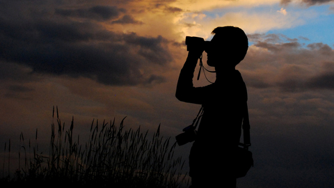 Binoculars at sunset