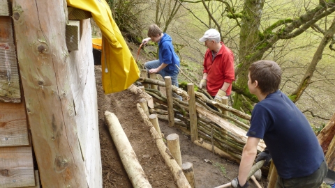 Volunteers fence contstructing