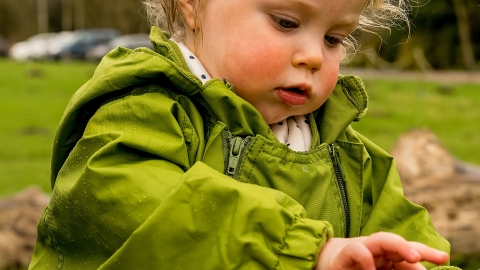 Toddler playing outside