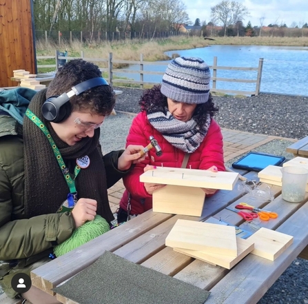 Lisa and Thomas at a Lincolnshire Wildlife Trust nest box building event.