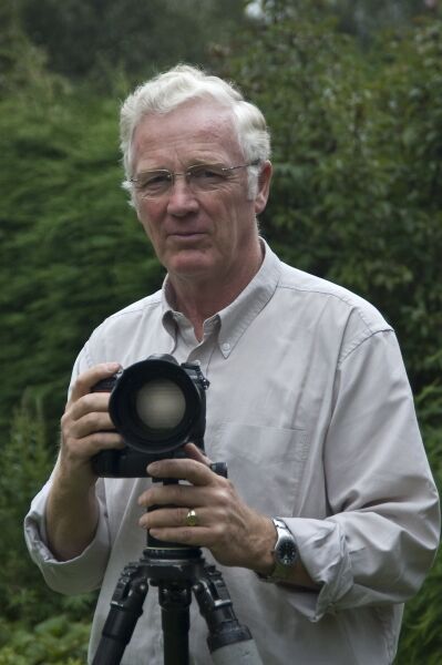 Geoff Trinder holding a camera
