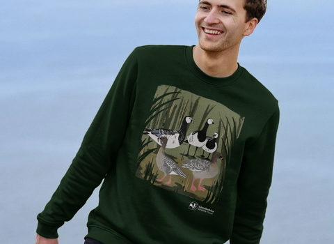 Model outdoors wearing Lincolnshire Wildlife Trust geese sweatshirt