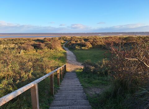 Gibraltar Point November view down steps and path towards sea